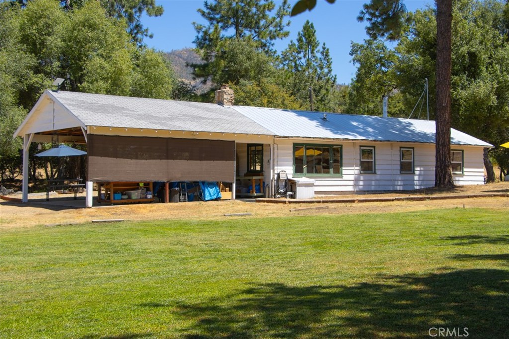 5641B Darrah Road Mariposa, CA 95338 - Photo 35 of 55 a front view of house with yard and swimming pool