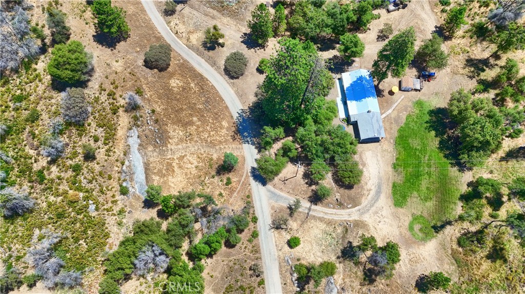 5641B Darrah Road Mariposa, CA 95338 - Photo 46 of 55 an aerial view of a house with a yard and garden