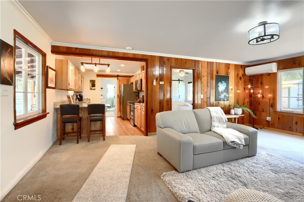 5641B Darrah Road Mariposa, CA 95338 - Photo 10 of 55 a living room with furniture and large windows