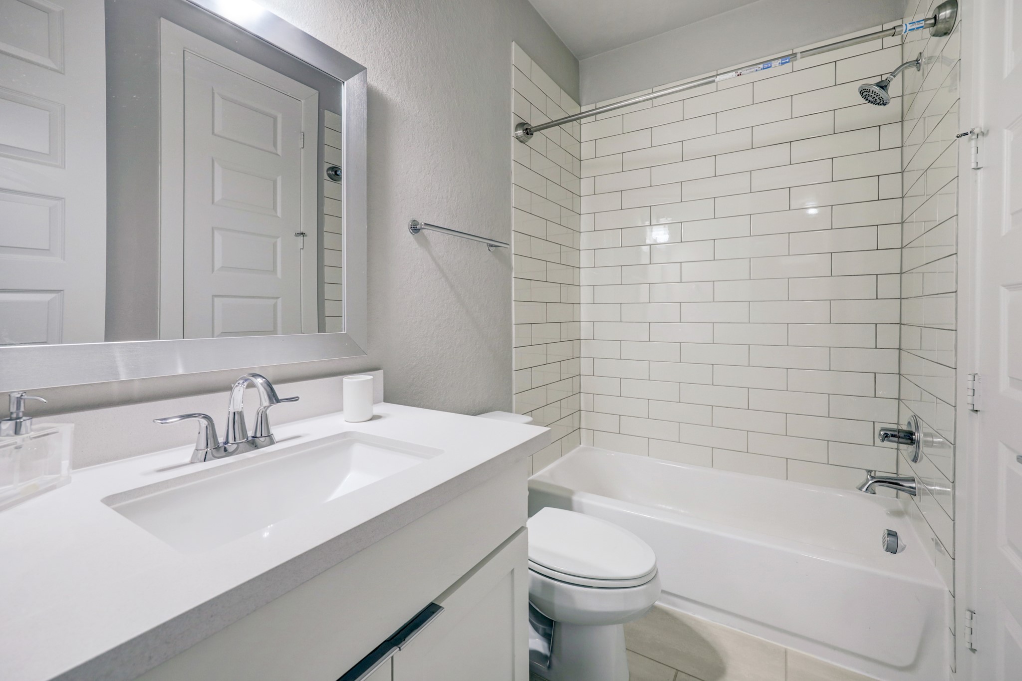 4203 Allen Street Houston, TX 77007 - Photo 7 of 35 a bathroom with a sink mirror toilet and bathtub