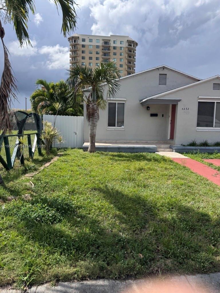 4232 Northwest 2nd Terrace, Unit A Miami, FL 33126 - Photo 1 of 11 a house view with a garden space