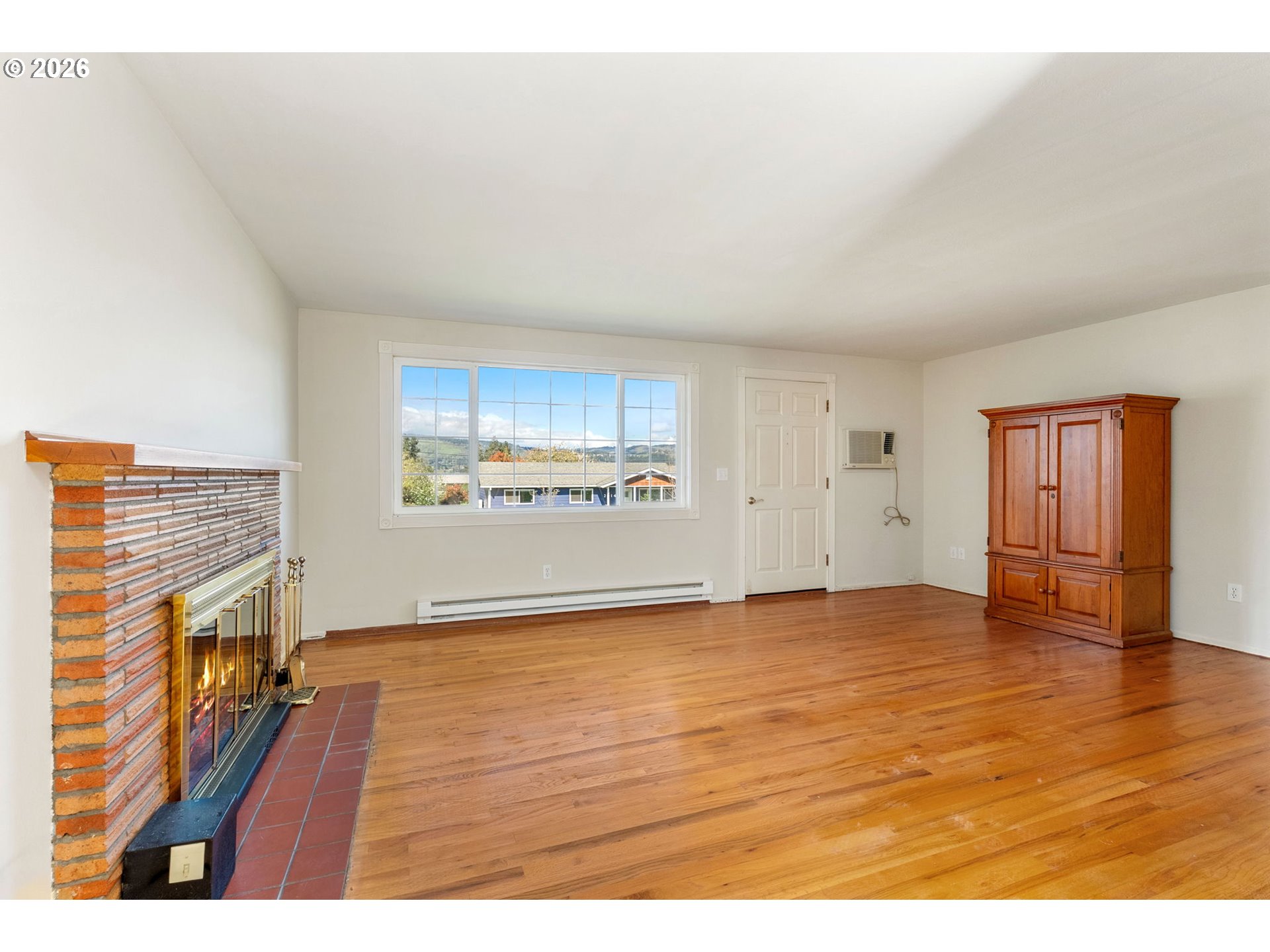 2419 Prospect Avenue Hood River, OR 97031 - Photo 12 of 27 a view of an empty room with window and wooden floor