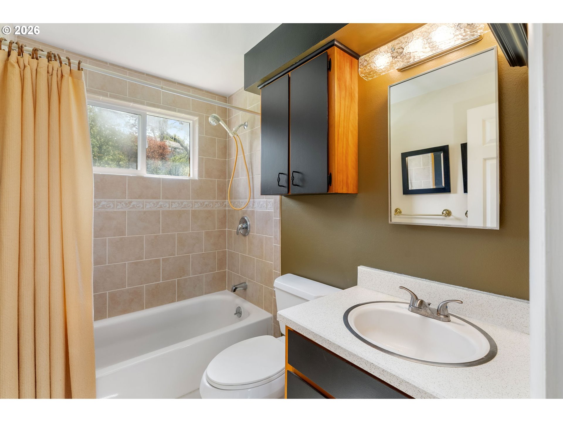 2419 Prospect Avenue Hood River, OR 97031 - Photo 19 of 27 a bathroom with a sink a bathtub and a mirror