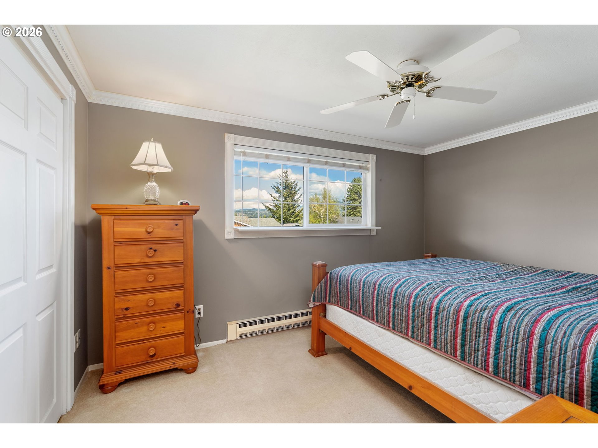 2419 Prospect Avenue Hood River, OR 97031 - Photo 21 of 27 a bedroom with a bed and a dresser
