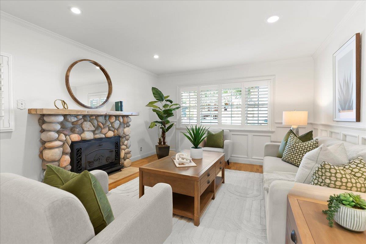 121 Jane Ann Way Campbell, CA 95008 - Photo 13 of 38 a living room with furniture a window and a fireplace
