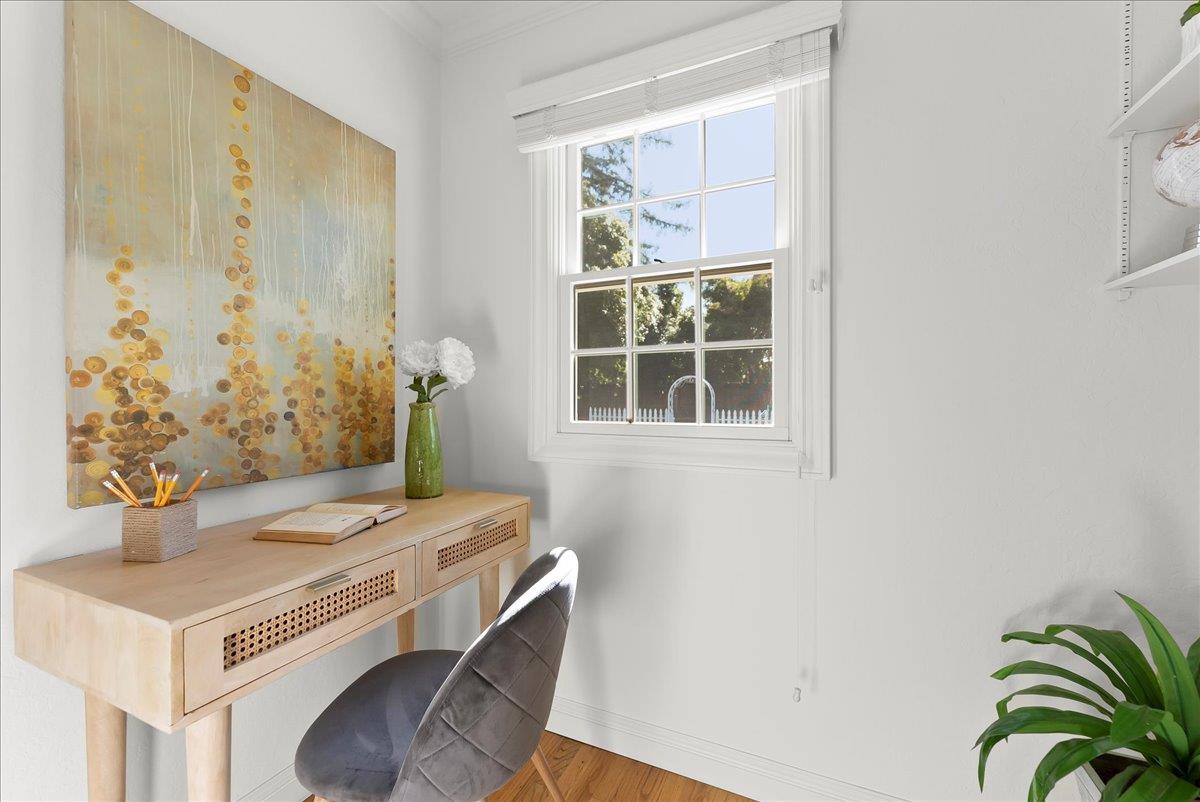 121 Jane Ann Way Campbell, CA 95008 - Photo 15 of 38 a room with a table and potted plant