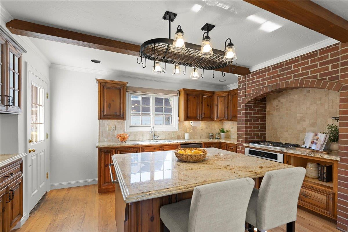 121 Jane Ann Way Campbell, CA 95008 - Photo 6 of 38 a kitchen with stainless steel appliances granite countertop a sink and chairs
