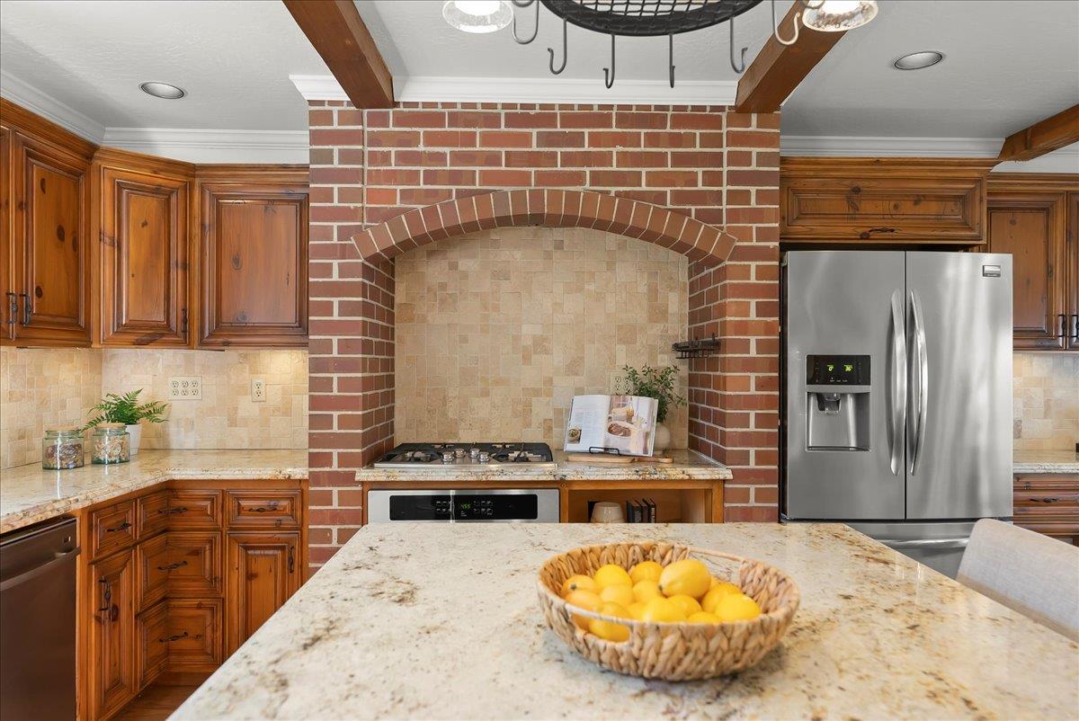 121 Jane Ann Way Campbell, CA 95008 - Photo 9 of 38 a kitchen with stainless steel appliances kitchen island granite countertop a stove and refrigerator