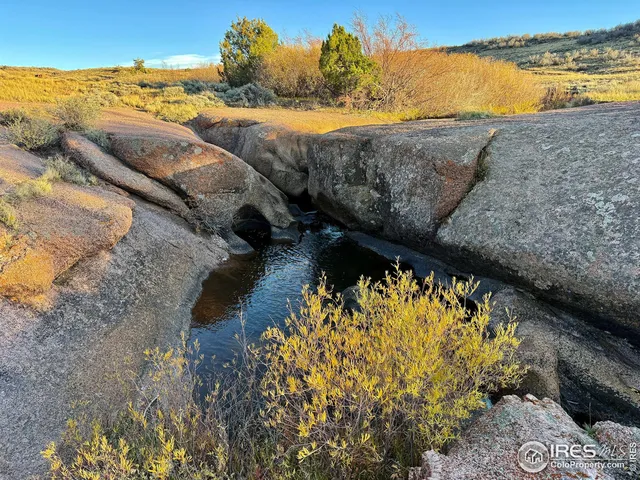 a view of mountain with lake view