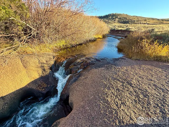 a view of a lake with a mountain in the background