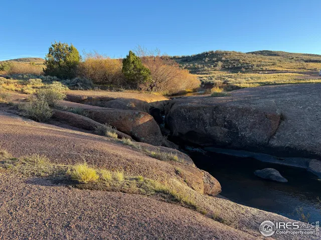 a view of a street with an outdoor space