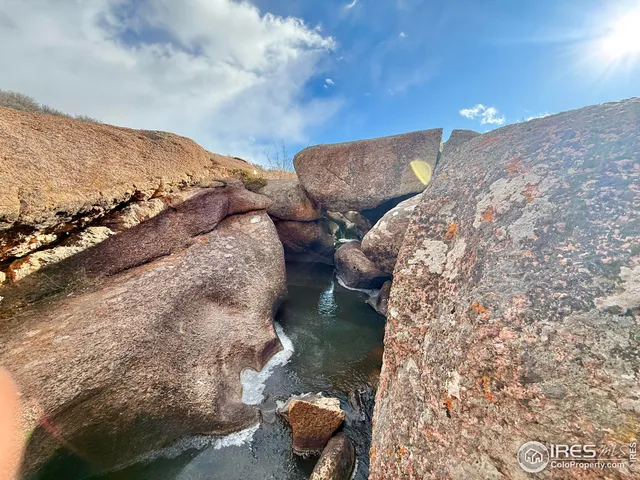a view of a road with an ocean view