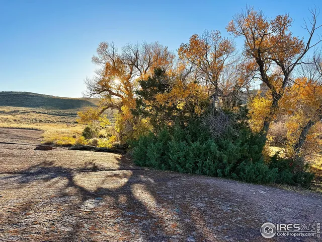 a view of an ocean and a mountain