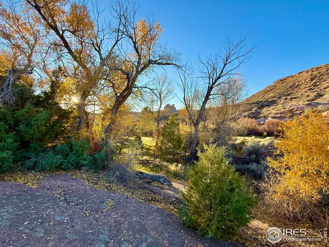a view of mountain and field
