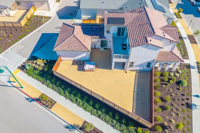 a view of house along with deck and living room