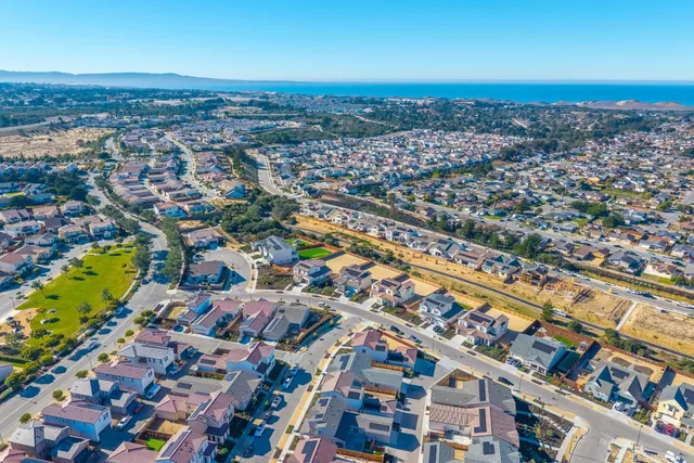 an aerial view of residential building and city street