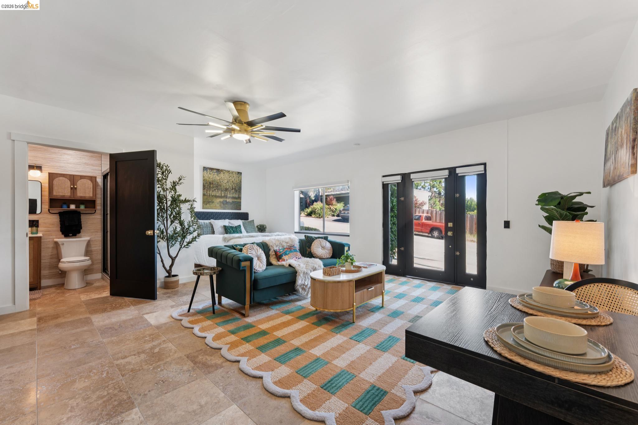 2301 Oak Street Berkeley, CA 94708 - Photo 51 of 61 Expansive interior space featuring natural stone tile flooring and a ceiling fan with integrated lighting