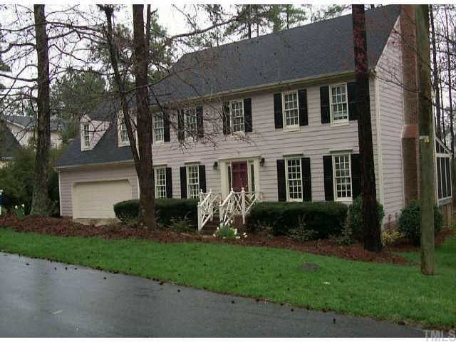 8512 Zinfandel Place Raleigh, NC 27615 - Photo 1 of 1 a front view of a house with garden and porch