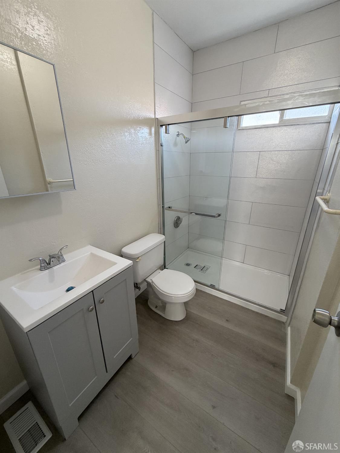 65 Minerva Street San Francisco, CA 94112 - Photo 14 of 24 a bathroom with a sink toilet and shower