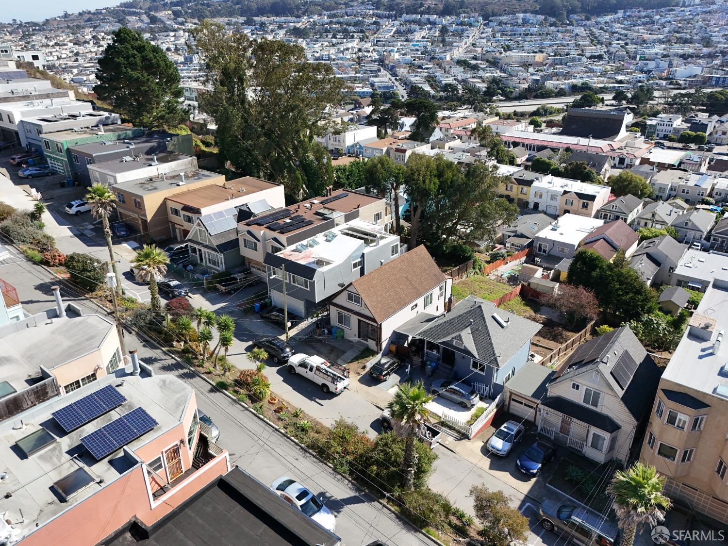 65 Minerva Street San Francisco, CA 94112 - Photo 22 of 24 an aerial view of a city with lots of residential buildings