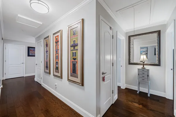 wooden floor with white walls