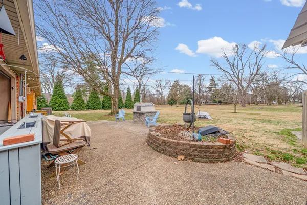 a view of a playground with a patio