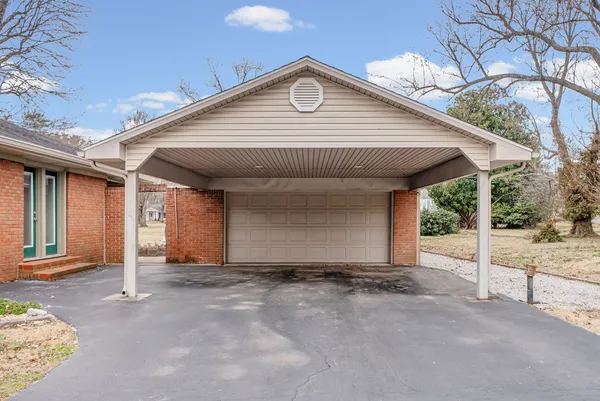 a front view of a house with a garage