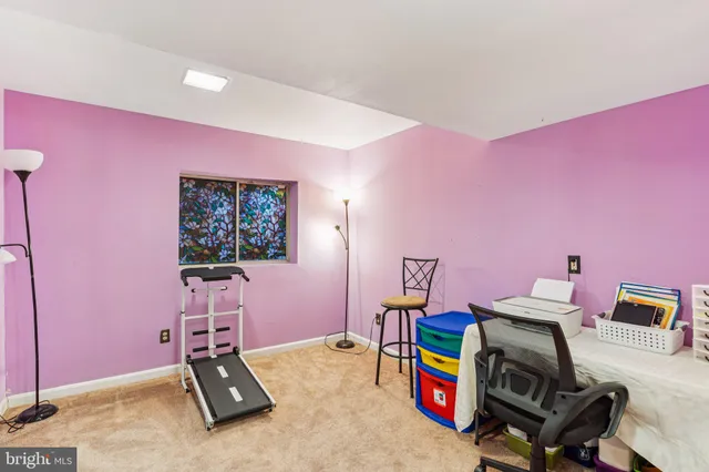 a room with furniture and a wooden floor