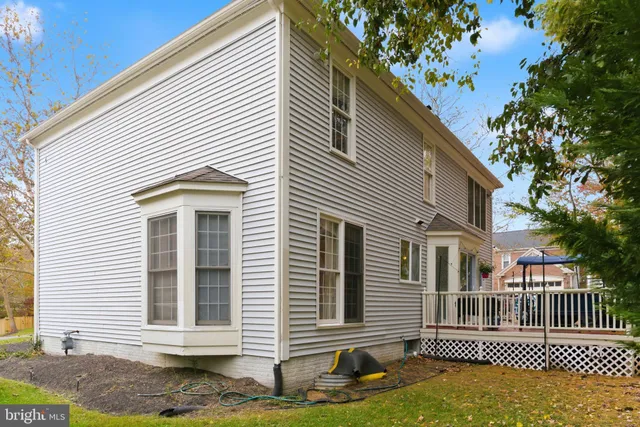 a view of a chairs and tables in the balcony