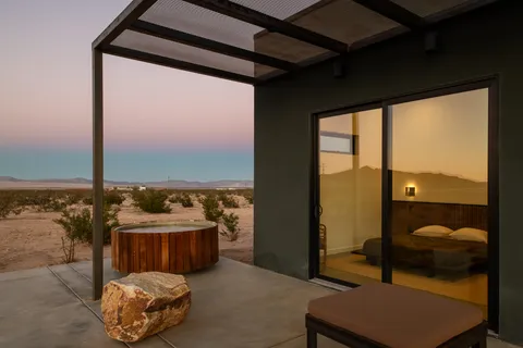 a room with a table and chairs