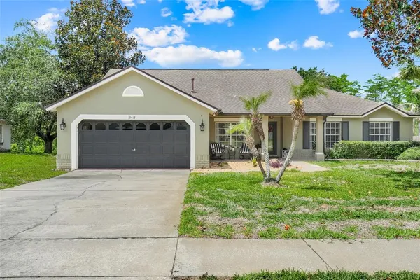 a front view of a house with yard