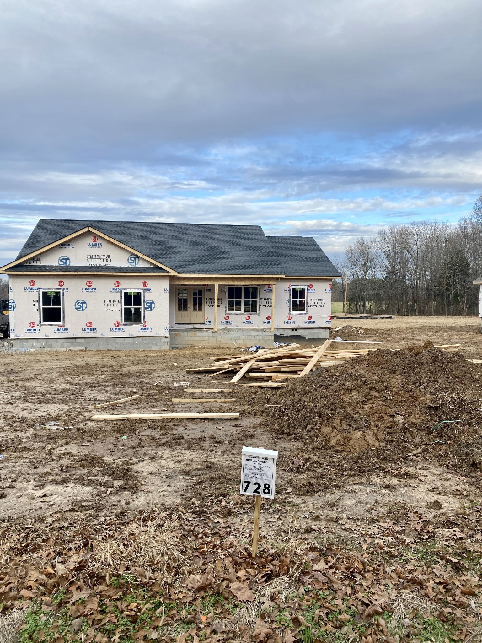 728 White Road Portland, TN 37148 - Photo 15 of 15 a front view of a house with a yard