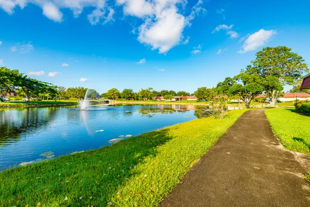 a view of a lake with a big yard