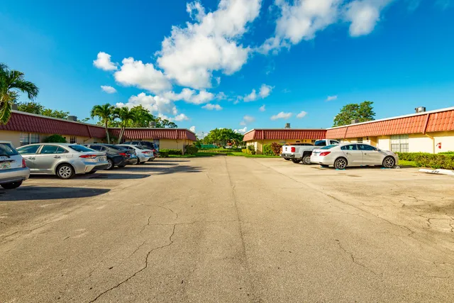 a view of a city street with cars