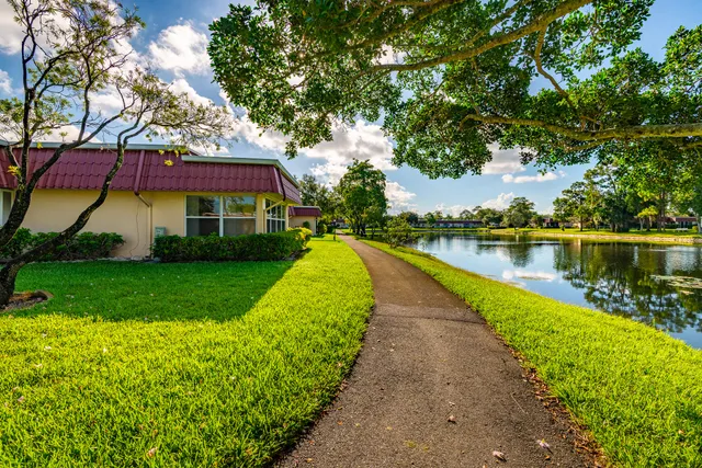 a view of a lake with a garden