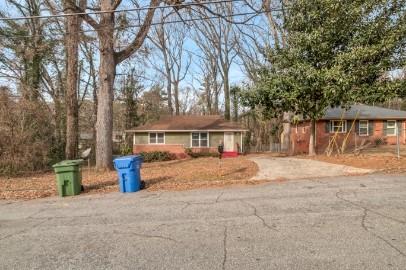 751 Yale Place Southwest Atlanta, GA 30315 - Photo 1 of 15 a front view of a house with a yard
