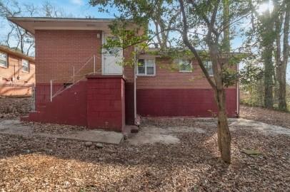 751 Yale Place Southwest Atlanta, GA 30315 - Photo 14 of 15 a view of a house with a yard