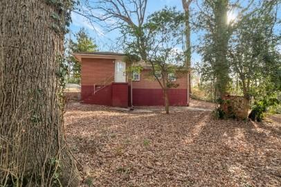 751 Yale Place Southwest Atlanta, GA 30315 - Photo 15 of 15 a view of a house with a yard and garage
