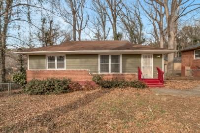751 Yale Place Southwest Atlanta, GA 30315 - Photo 2 of 15 a front view of a house with garden