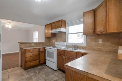 751 Yale Place Southwest Atlanta, GA 30315 - Photo 5 of 15 a kitchen with a sink stove and cabinets