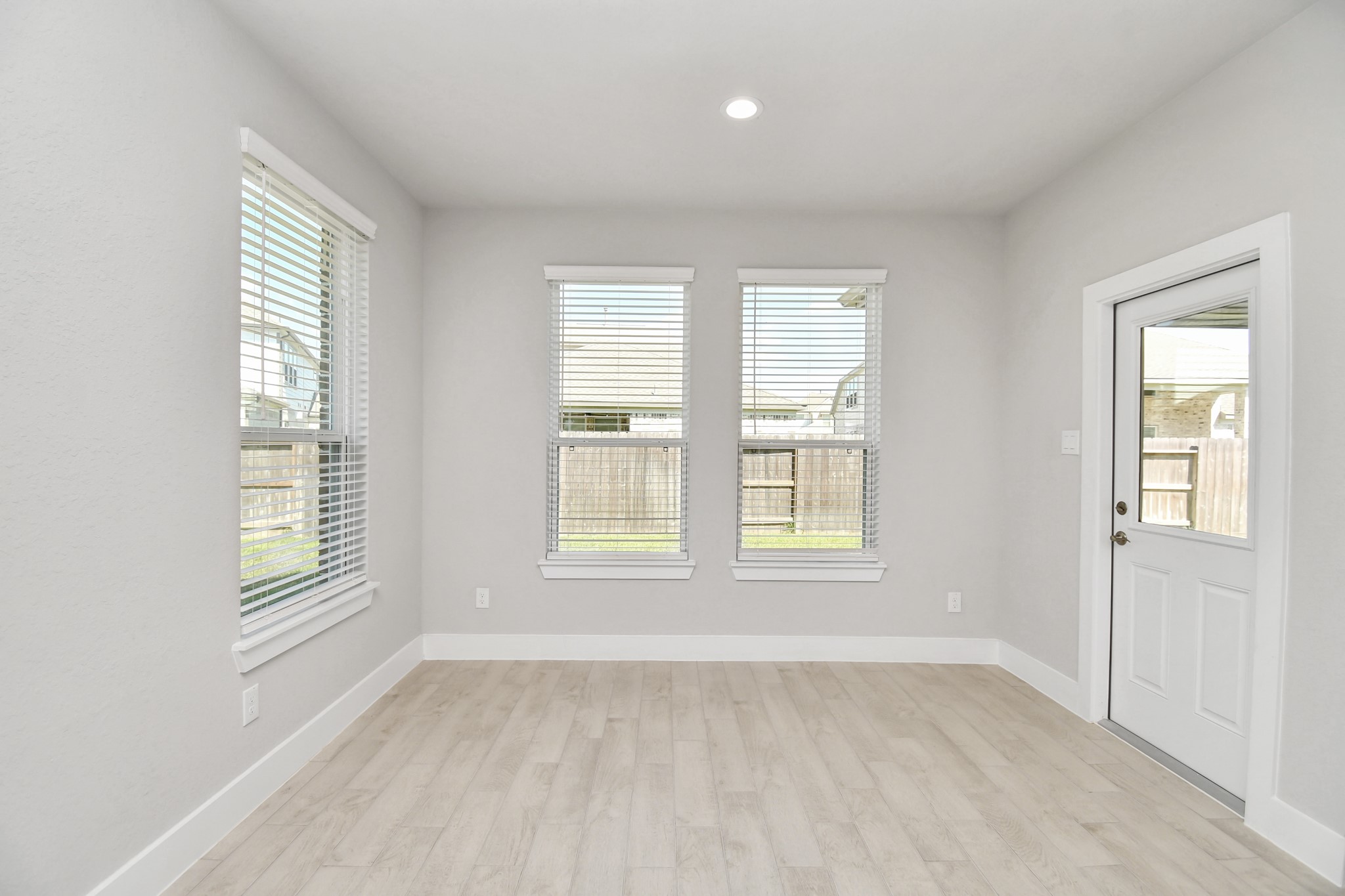 3106 Native Spg Drive Spring, TX 77373 - Photo 15 of 38 Enjoy breakfast with ease in the connected and cozy breakfast area, seamlessly integrated with the kitchen for utmost convenience. Step through the back door for a breath of fresh air onto the covered patio, extending your living space to the outdoors. Sample photo of completed home with similar floor plan. Actual colors and selections may vary.