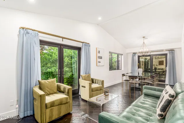 a bathroom with a sink double vanity and a shower