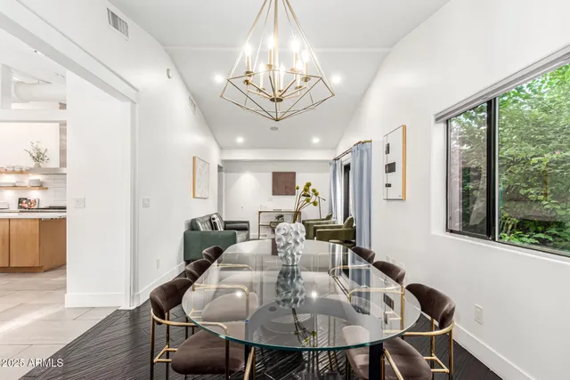 a bathroom with a sink double vanity and a mirror