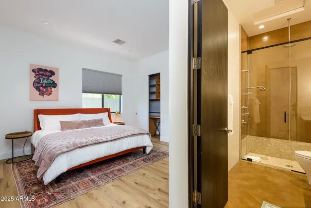 a view of a patio with a table chairs and a table