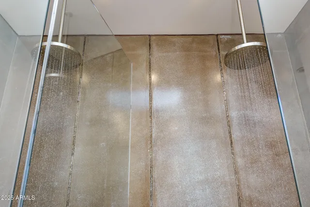 a view of a patio with a table and chairs