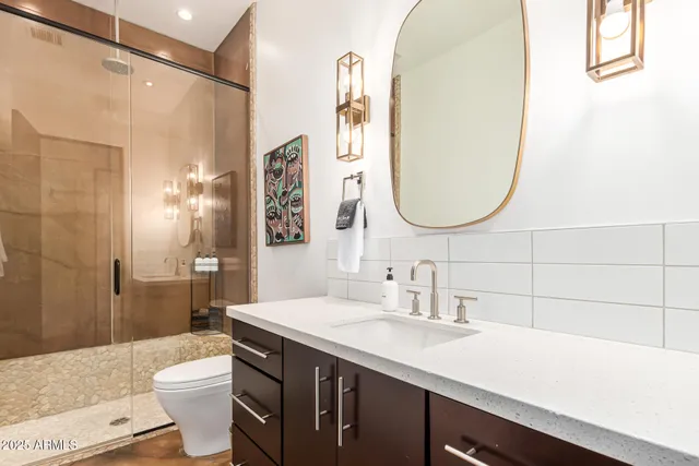 a view of a backyard with chairs and a small yard