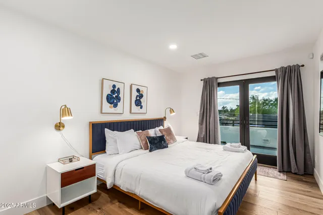 a kitchen with stainless steel appliances and a potted plant