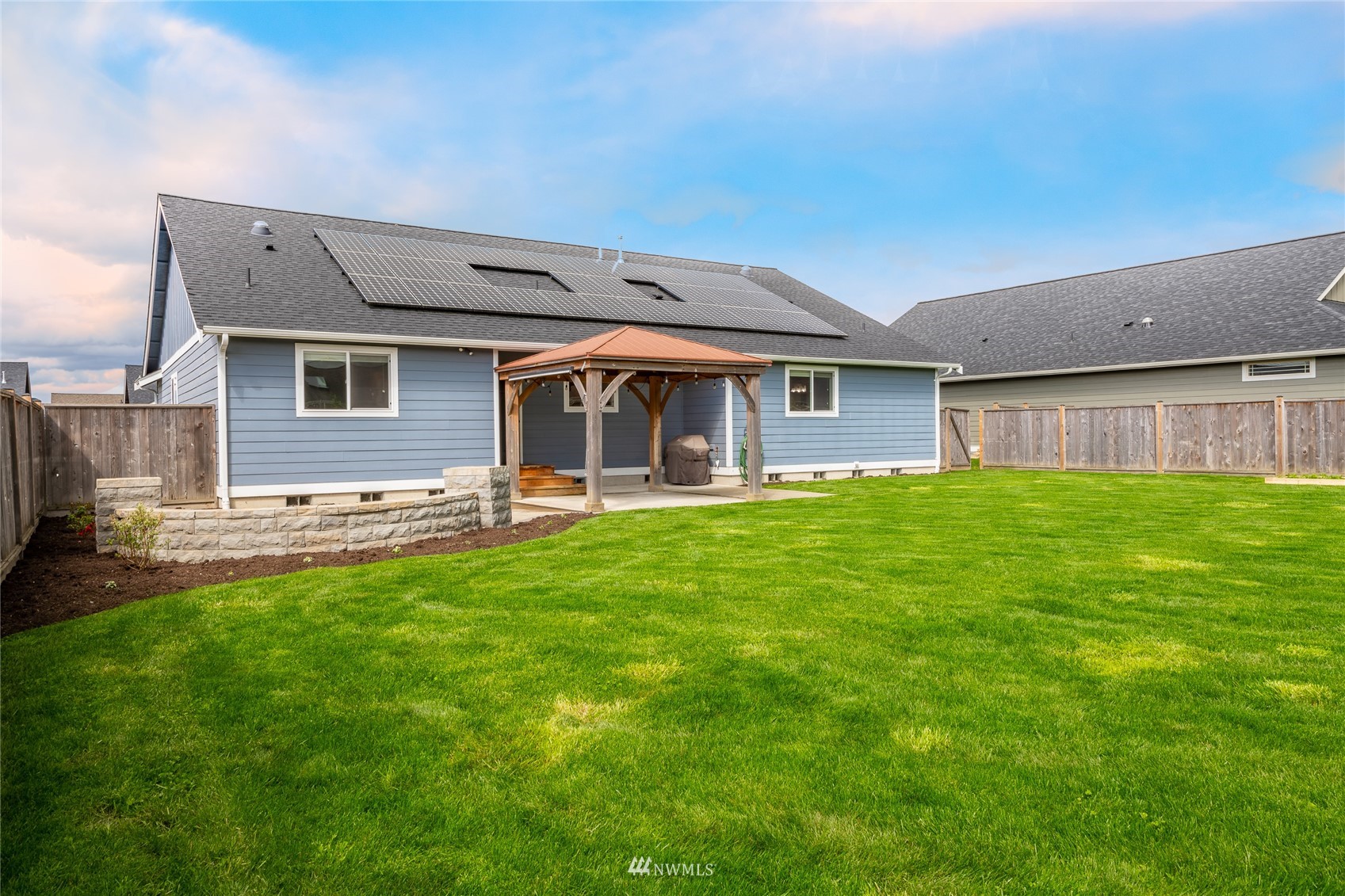 409 Amareen Court Nooksack, WA 98276 - Photo 27 of 35 a front view of house with yard and green space