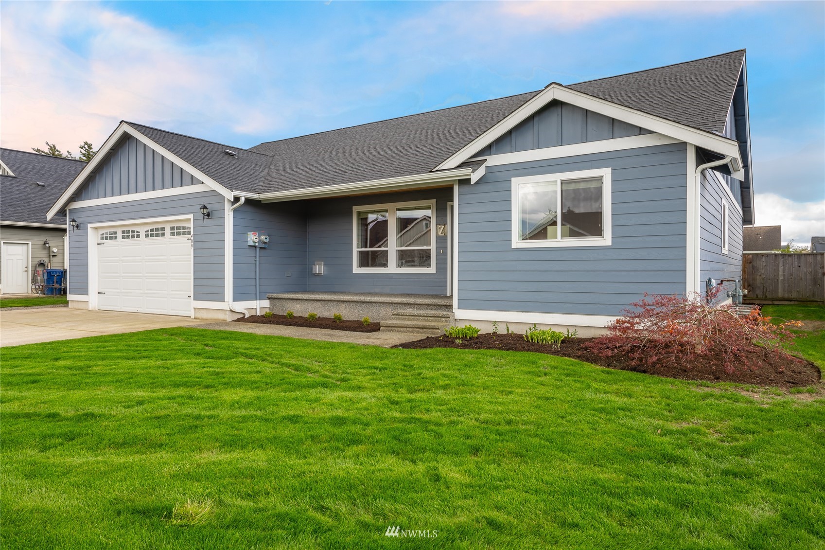 409 Amareen Court Nooksack, WA 98276 - Photo 34 of 35 a front view of a house with a yard
