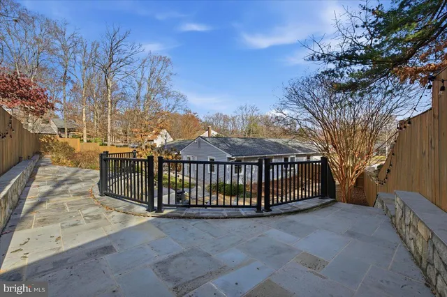 a front view of a house with table and chairs
